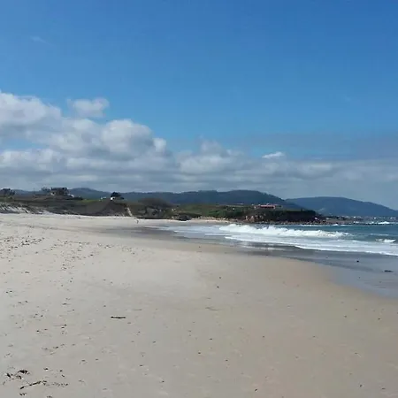 En Playa De *
